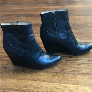 Black Frye leather wedge boots. Regina bootie